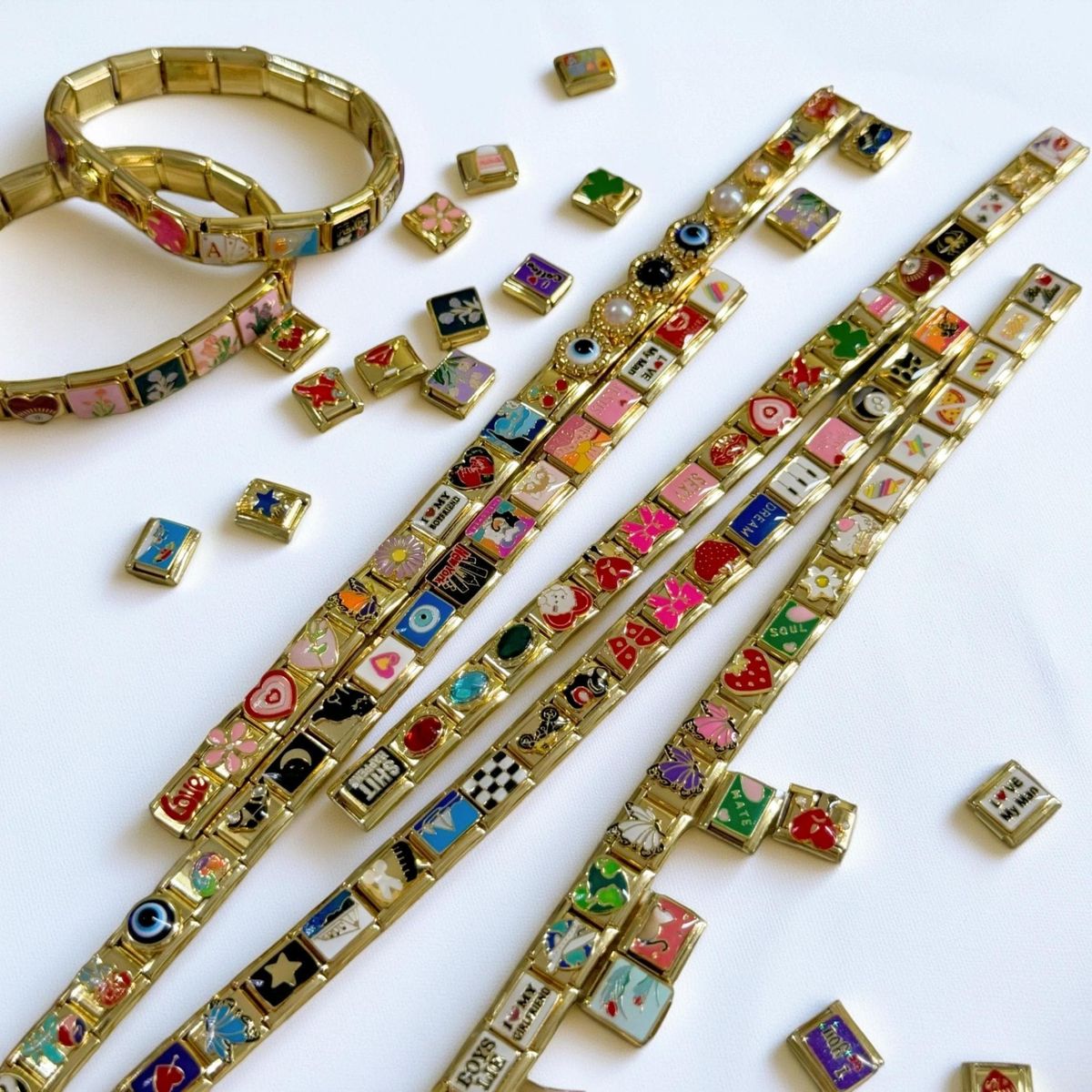 Elegant gold Italian charm bracelet with personalized letter and heart charms sparkling under soft light