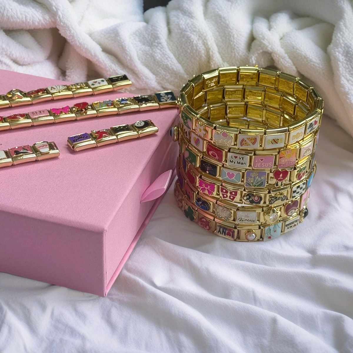 gold Italian charm bracelet stacked together with kinds of charms