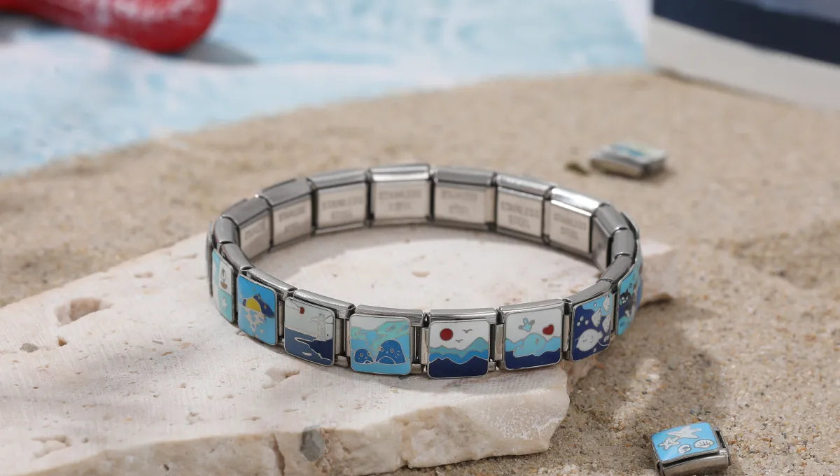 Ocean-themed italian charm bracelet with coral, jellyfish, and fish charms from CHARMSDIY