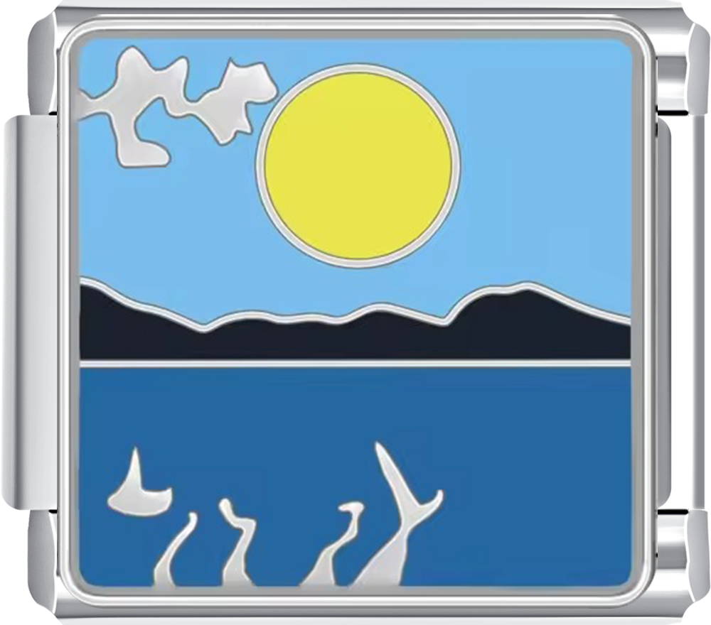 Metallic charm with a scenic design of a sun, mountains, and birds on a blue background.