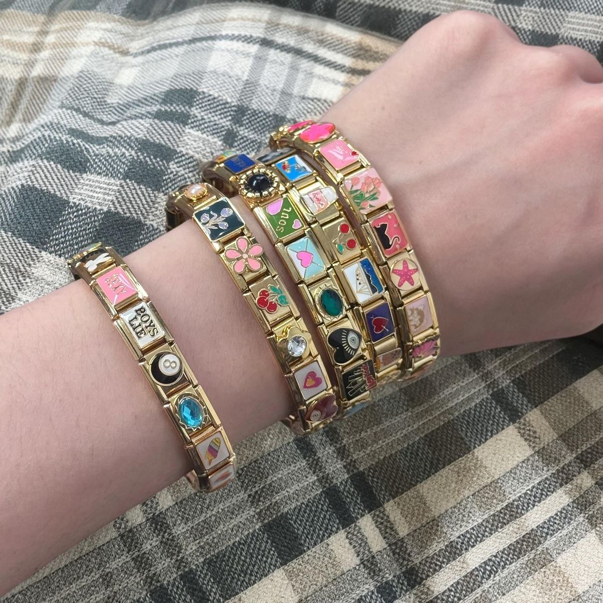 Woman wearing an Italian charm bracelet