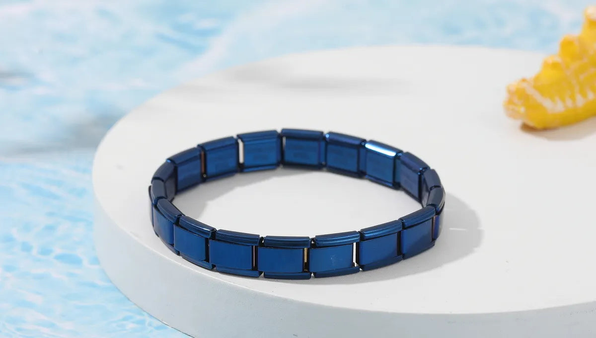 Modular Italian charm bracelet in solid blue, made from waterproof stainless steel.